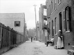 Alley in an urban United States slum area ca. 1914