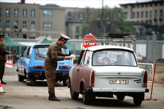 East German policeman monitors traffic