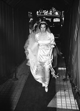 Bride walking at wedding