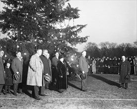 Calvin Coolidge and group at Christmas tree