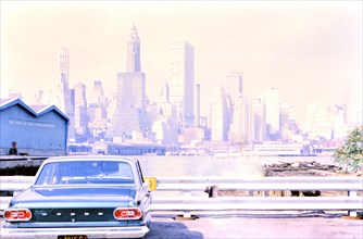 Car parked in front of New York City skyline ca. 1960s