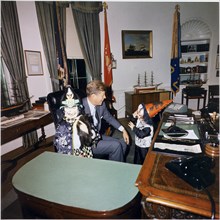 Caroline and JFK Jr. visit their father President Kennedy on Halloween
