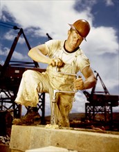 Carpenter at work on Douglas Dam