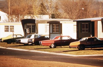 Cars parked in front of mobile Homes