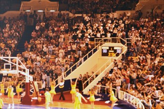 Cheerleaders performing before a basketball game