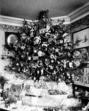 Christmas tree in early 1900s living room