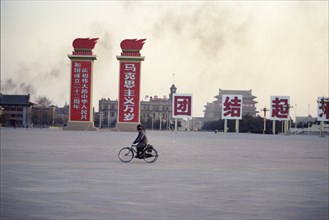Street Scene with Signs and Bicyclists in Peking