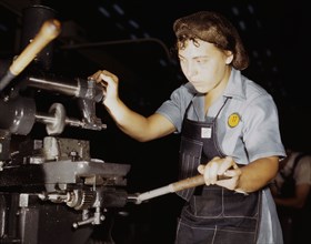 Female machine worker helps in the United States war effort