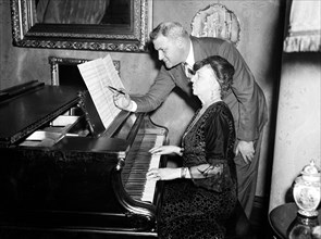Man and woman at piano