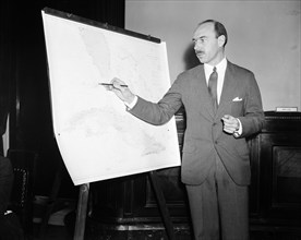 Man pointing to a map chart
