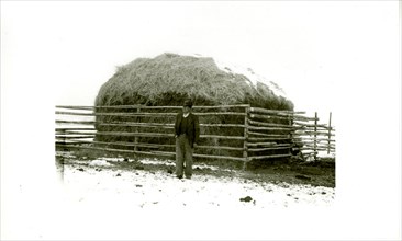 Man with Large Hay Bale 1934