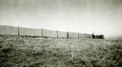 Man Working on Fence ca 1947
