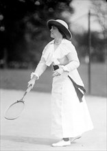 Mrs. J. Upshur Morehead playing in a tennis tournament