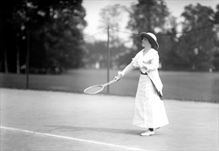 Mrs. J. Upshur Morehead playing tennis at a tournament in 1913