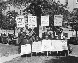 Picketers with signs