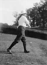 Politician playing golf ca. 1917