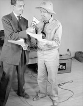 Superintendant, Newell, with CBS Announcer