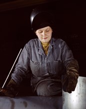 Woman welder at Heil and Co.