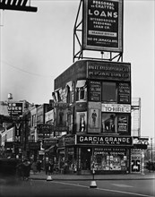 Billboards and signs, Fulton Street between State street and Ashland place, Brooklyn ca. 1936