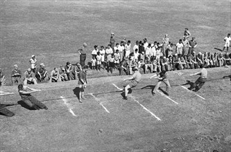 Indonesia History - Te Poerwakarta celebrated Queen's Day 1948 with a game of tug of war ca. 1948.