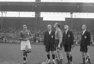 September 21, 1947 - Netherlands - Switzerland 6-2 - 'The toss' Right - Dutch captain Arie de Vroet, left the Swiss captain Lauro Amado