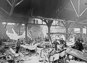 Men in a workshop hammering sheets of copper for the construction of the Statue of Liberty ca. 1883