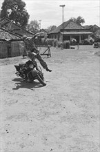 Demonstration skills motorcycle riding in Indonesia, Dutch East Indies ca. 1947