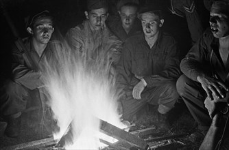 Dutch Soldiers around a campfire in Indonesia, Dutch East Indies ca. 1947
