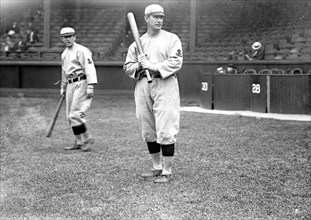Roger Bresnahan, St. Louis, NL, Miller Huggins in background (baseball) ca. 1911