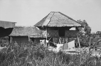 House with laundry; Date March 1946; Location Indonesia, Dutch East Indies