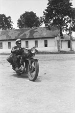 Motorcycling exercises; Date April 1947; Location Bandung, Indonesia, Dutch East Indies