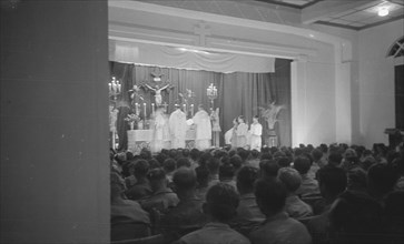Catholic worship in a theater or cinema; Date December 2, 1946 Location Bogor, Indonesia, Dutch East Indies