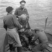 September 24, 1947 - Deep Sea Diver preparing for a dive