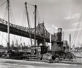 1930s New York City - Queensboro Bridge: Long Island City, Queens, looking southwest from pier at 41st Road, Queens ca. 1937