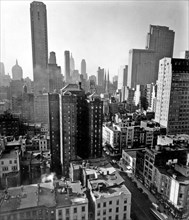1930s New York City - View south from 57th Street includes Empire State Bldg., New York Central Bldg., Rockefeller Center, the General Electric Bldg ca. 1937