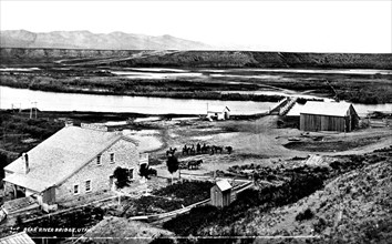 1872 - Bear River Hotel and Bear River Bridge at the crossing on the line of the old stage line from Ogden to Montana (located in Box Elder County, Utah).