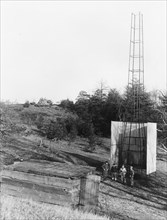 Dr. Robert H. Goddard's tower and shelter at the Army artillery range at Camp Devens, in Ayer, Massachusetts in the winter of 1929-1930. Goddard originally began testing rockets on his aunt's farm in ...