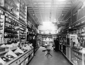 Interior of People's Drug Store, No. 5, 8th and H Streets, N.E., Washington, D.C., with employees and customers ca. 1909-1932