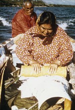 1975 approx - Eskimos from the village of Ambler collecting birch bark for the making of traditional baskets , Kobuk Valley