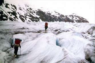 Men Climbing the snout of Exit Glacier, Alaska Ca. 1975