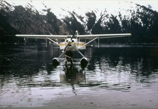 6/10/1976 - Plane dropping off people in McCarly Lagoon, Alaska