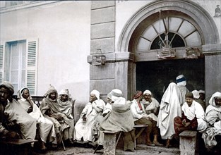 Arabs at a cafe, Algiers, Algeria ca. 1899