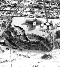 March 27, 1964 Alaska earthquake. The landslide occurred next to this hospital in Anchorage which is showing graben and pressure ridges.