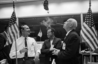 (15 Dec. 1965) Christopher C. Kraft Jr. (left), red team flight director; astronaut L. Gordon Cooper Jr. (center); and Dr. Robert R. Gilruth, Manned Spacecraft Center director.