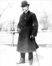 Photo shows New York politician William Bourke Cockran (1854-1923), standing with cane