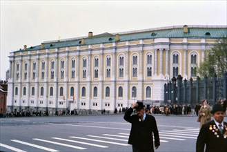 Pedestrians outside of the Armory Museum in Moscow Russia on a cool spring day in late 1970s (1978)