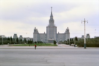 Buildings and architecture in a major city in Russia, communist star on top of building - Moscow State University ca. 1978