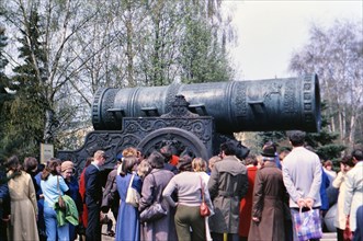 Tourists looking at the Tsar Cannon at the Kremlin, Moscow in late 1970s (ca. 1978)