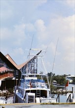 Boat docked in a marina in Florida during the late 1970s