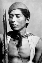 Typical fighting man of the head hunters, Formosa